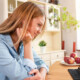 A woman listens to her therapist over video chat. This could represent the the convenience of telepsychiatry in New York, NY. Learn more about online adult psychiatry in New York, NY by contacting an online psychiatrist in New York, NY today!