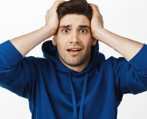 Image of a man looking very anxious. Feeling this way is part of becoming a parent. Which is why postpartum emotions must be shown care, and find Alcohol addiction help in New York, NY when its needed.
