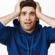 Image of a man looking very anxious. Feeling this way is part of becoming a parent. Which is why postpartum emotions must be shown care, and find Alcohol addiction help in New York, NY when its needed.