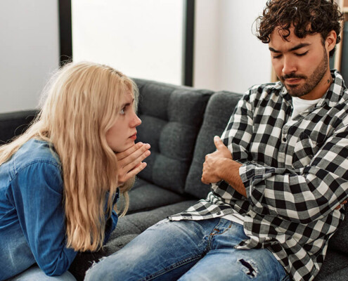 Couple in a tense conversation about an alcohol relapse.