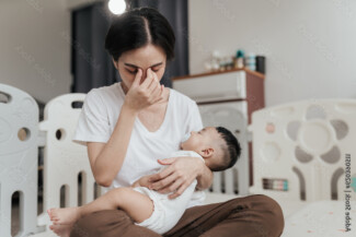 A woman holds her baby close while staring off into the distance. Learn how an online psychiatrist in New York, NY can offer support with addressing postpartum depression and more. Learn more about online psychiatry in New York, NY, and other services by searching for addiction specialist NYC today.