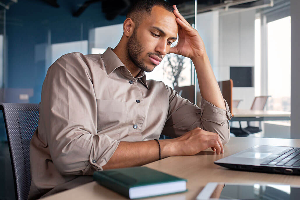 A man rests his head on on hand as he appears depressed as he thinks about something. Adult psychiatry in New York, NY can help you feel more at peace with online adult psychiatry in New York, NY. Learn more from an adult psychiatrist or search