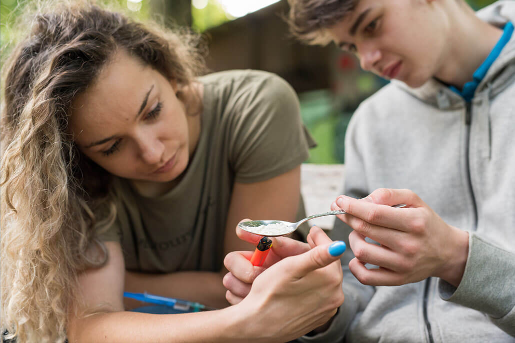 Young friends trying drugs. This could represent the need to find a virtual psychiatrist in New York, NY. Contact us to how online psychiatry in New York, NY can support you from home today! 10022