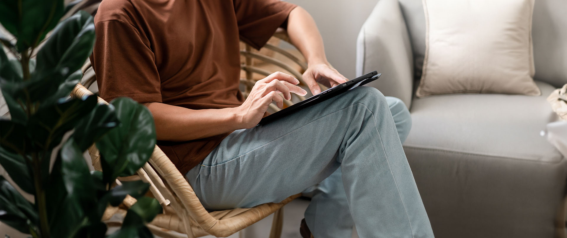 Young man perusing addiction treatment options on his mobile device