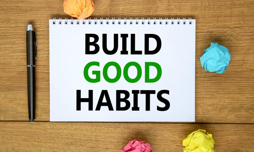 A close up of a notebook with the text "build good habits" next to a pen and balled up paper. Learn more about how alcohol addiction treatment in New York, NY can offer support in building good habits. An addiction therapist in New York, NY can offer alcohol treatment and others services.