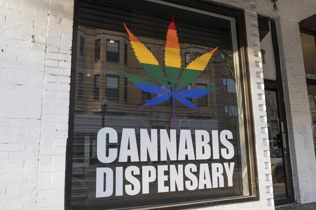 An image of a cannabis dispensary window with a weed rainbow weed leaf design. Learn more about marijuana abuse in New York, NY and how an online psychiatrist in New York, NY can offer support. An addiction therapist in New York, NY can help you form the comfort of home. 