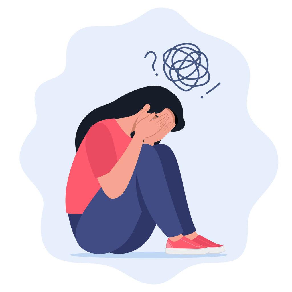 A graphic of a person sitting and covering their face. Contact an addiction therapist in New York, NY to learn more about adult psychiatry in New York, NY and other services. 
