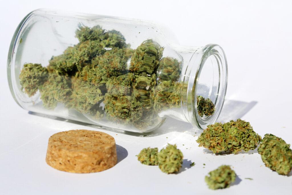 A close up of an open jar with weed falling out of it. Contact an addiction therapist in New York, NY to learn about the benefits of psychiatry today. An online psychiatrist in New York, NY can offer support from the comfort of home. 